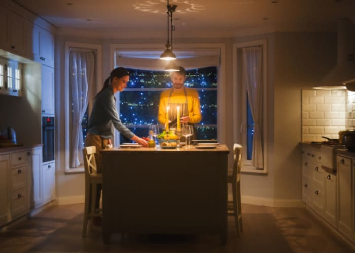 happy couple cooking and having dinner together