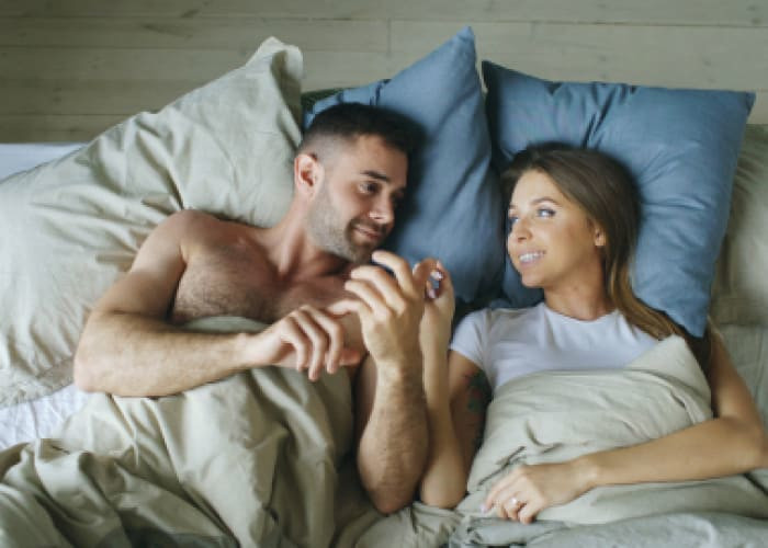 couple lying in bed