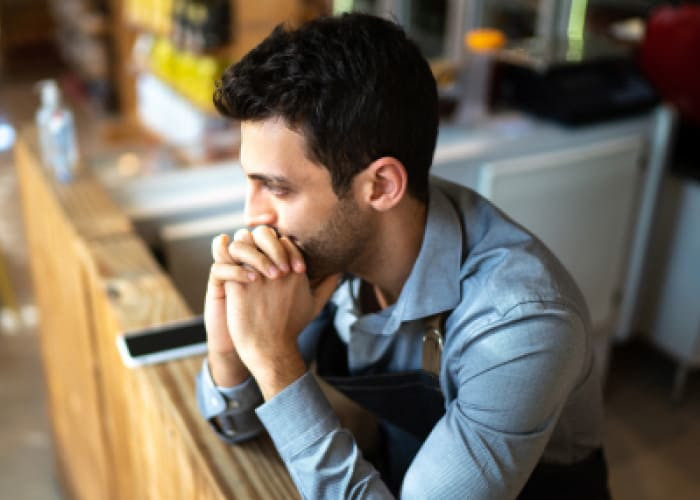 man sitting and thinking