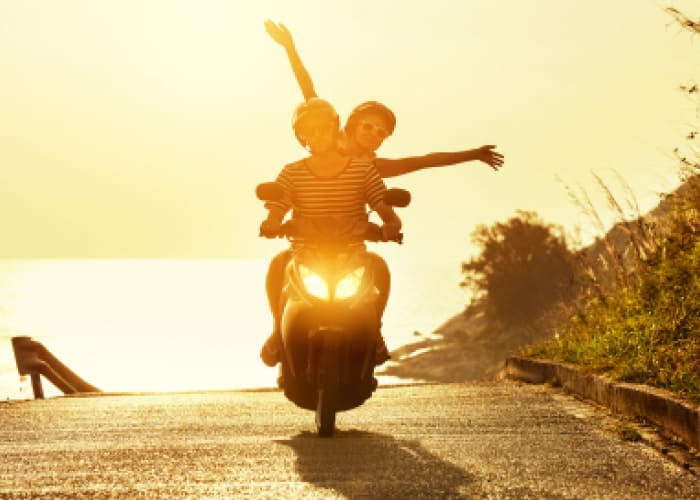 couple traveling motorcycle