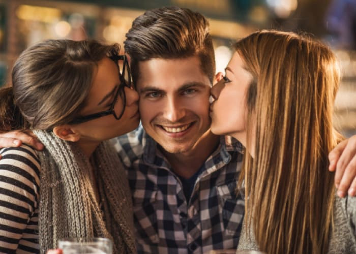 young people in a love triangle at bar