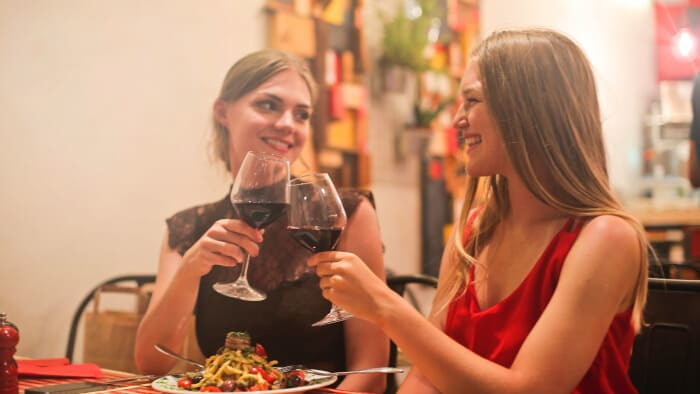 bisexual girlfriends in restaurant photo