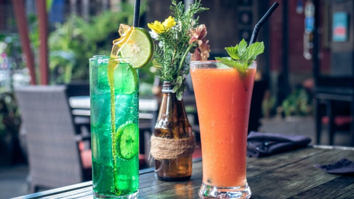 lime juice and fruit shake on glass 