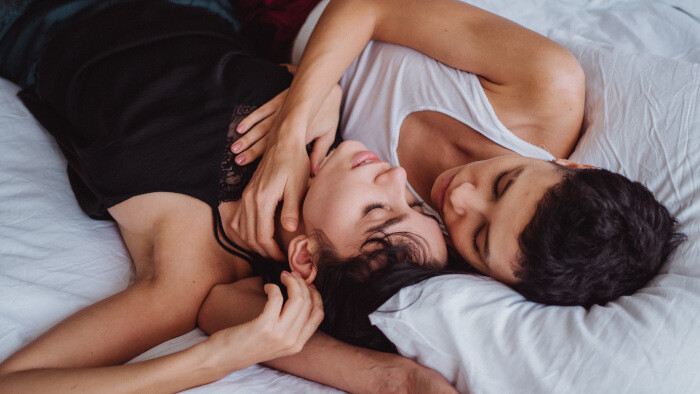 two women sleeping together